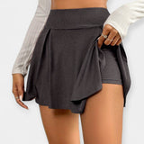 Tenis kratke hlače z vgrajenim krilom za športni in ženski slog